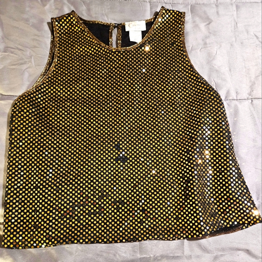 Crop top party top, size large but on the medium size. Very cute and soft.